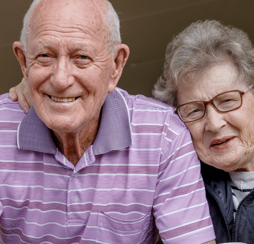 Older couple sitting - National Older American's Month
