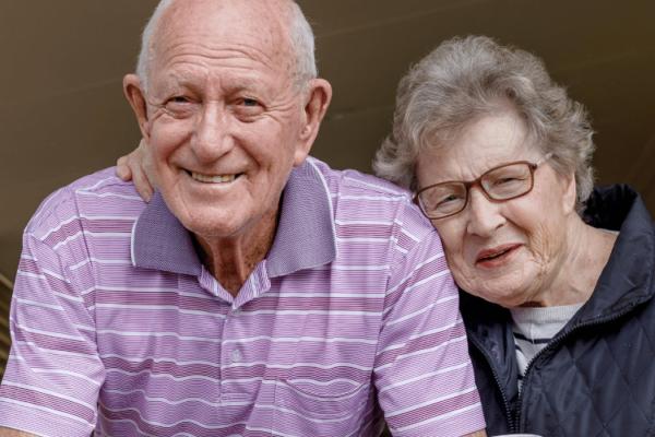 Older couple sitting - National Older American's Month