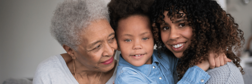 Grandma with daughter and and grandchild - National Older Americans Month
